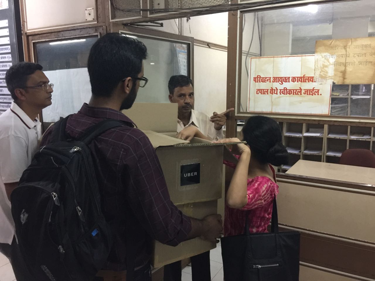 Uber employees deliver the first round of signed petitions to the Transport Commisioner's office on Friday. (Photographer: Vishal Patel)